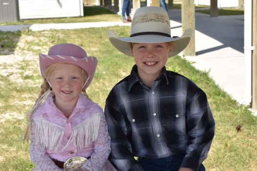 girl and boy dresses in county attire